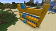 Redstone torches are vital for activating and deactivating the trapdoors (Image via Mojang)